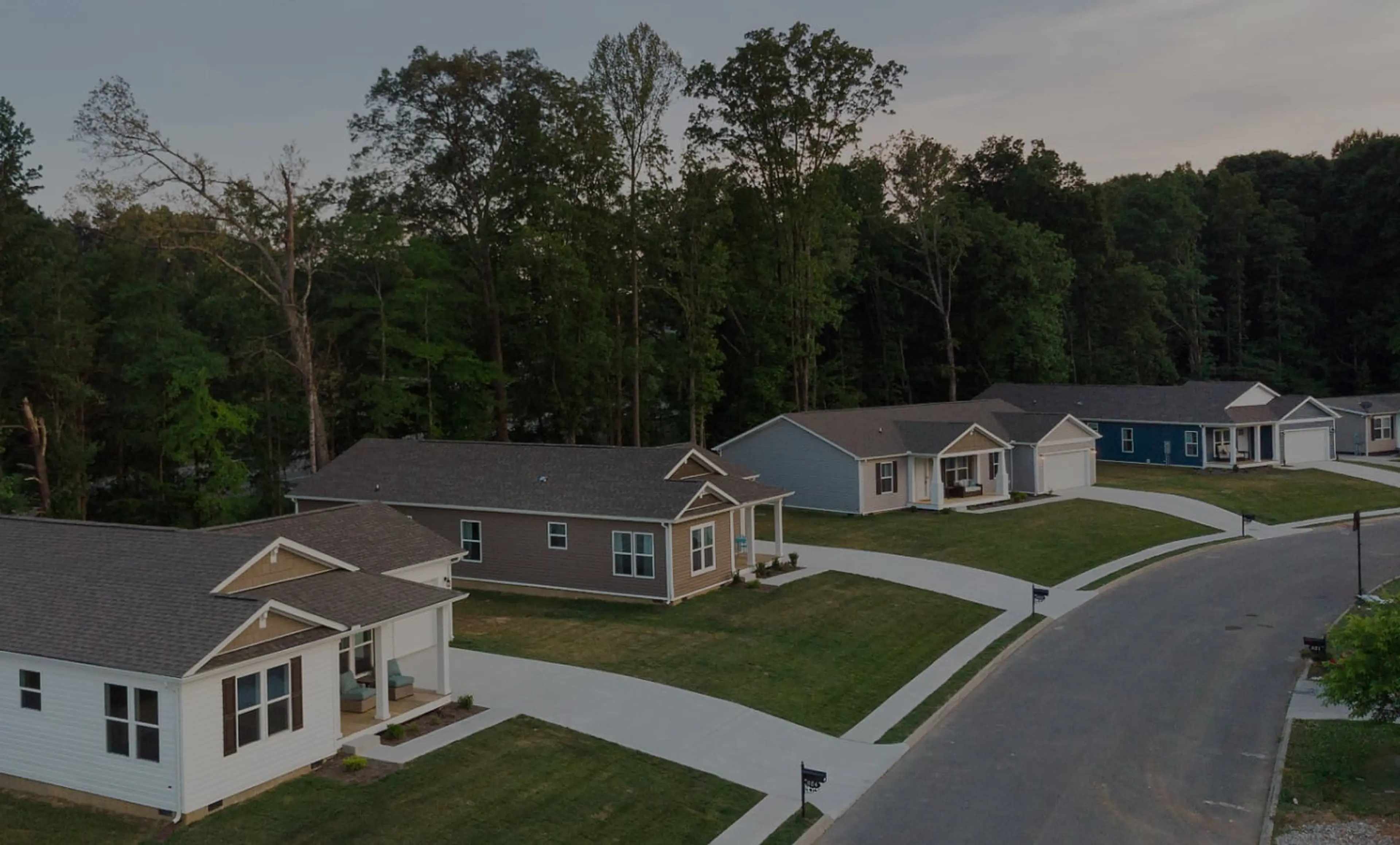 Neighborhood scene featuring a collection of Clayton homes